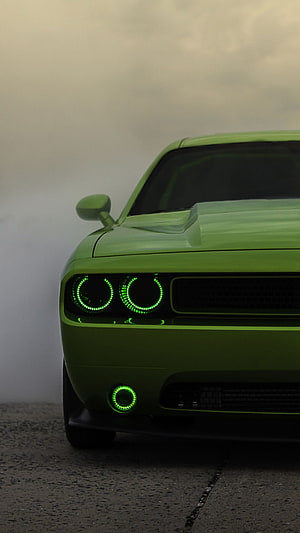 Green Dodge Challenger Front View With Glowing LED Headlights In Foggy Atmosphere HD phone wallpaper