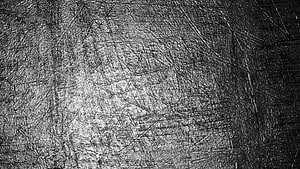 Scratched Metal Surface Texture with Dark Grunge Finish and Industrial Wear HD wallpaper