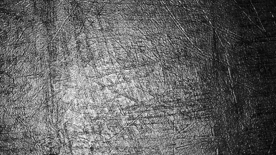 Scratched Metal Surface Texture with Dark Grunge Finish and Industrial Wear HD wallpaper