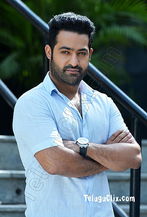 JR NTR Confident Portrait in Light Blue Shirt with Arms Crossed HD phone wallpaper