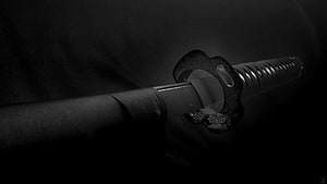 Dark Katana Sword Close-Up with Ornate Tsuba and Wrapped Handle HD wallpaper