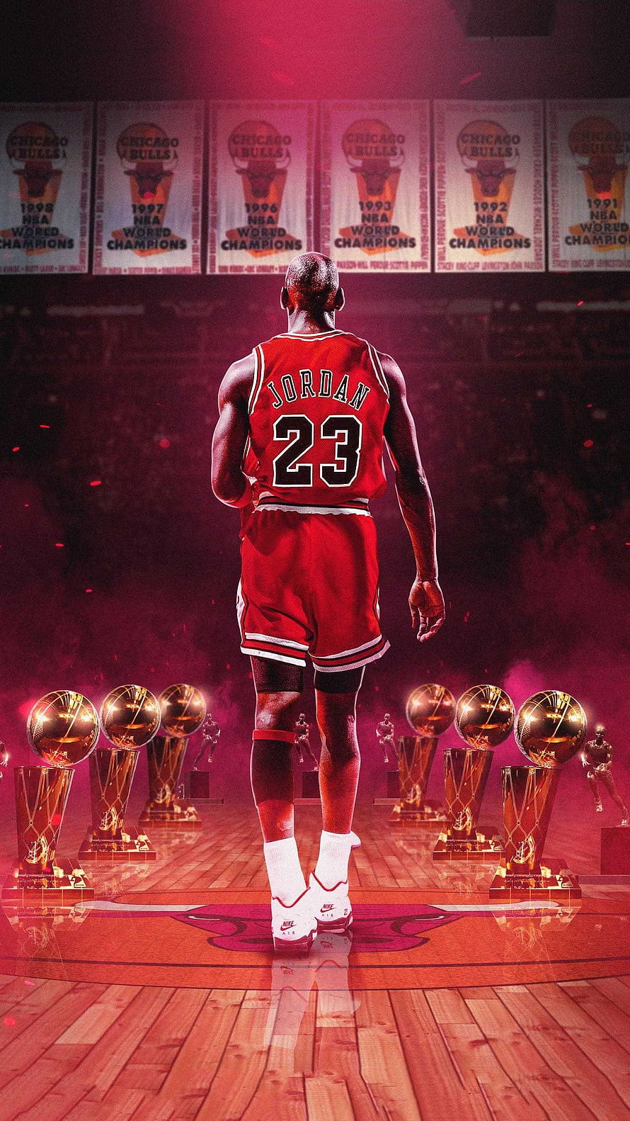 Michael Jordan in Chicago Bulls jersey standing before six championship trophies on the court HD phone wallpaper