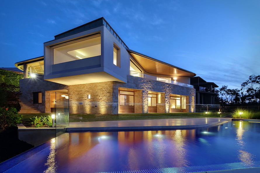 Contemporary Luxury Residence with Infinity Pool at Dusk HD wallpaper