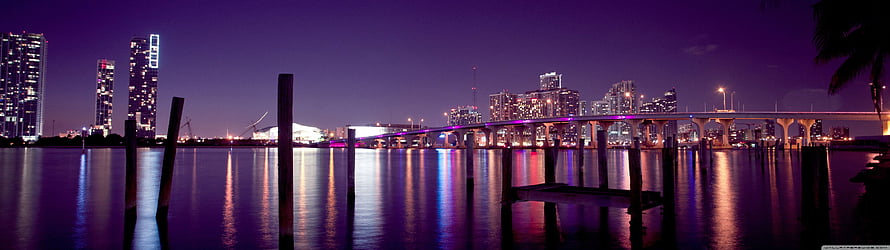 Panoramic Night View of Miami Skyline with Biscayne Bay Waterfront and Bridge Reflections HD wallpaper