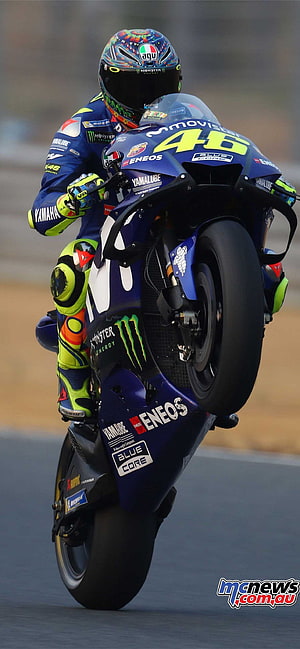Valentino Rossi on Yamaha YZR-M1 MotoGP Bike During Track Practice HD phone wallpaper