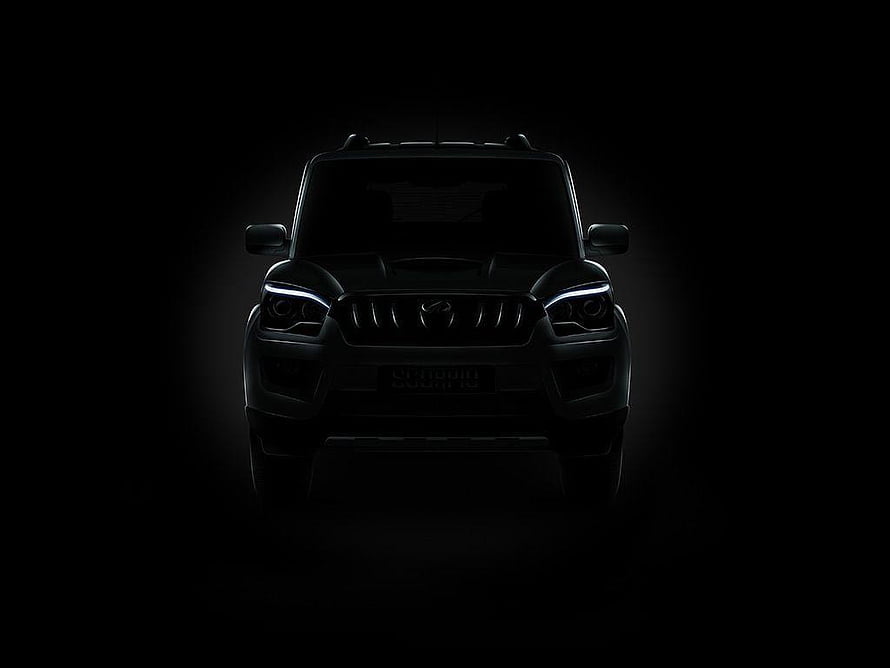 Mahindra Scorpio Front View in Dramatic Dark Lighting with Glowing LED Headlights HD wallpaper