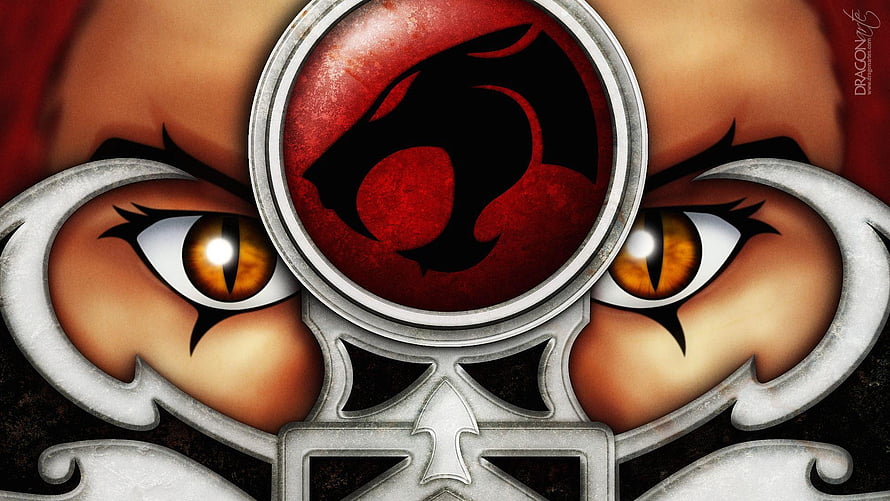 Thundercats Lion Emblem with Fierce Amber Eyes and Ornate Silver Frame HD wallpaper