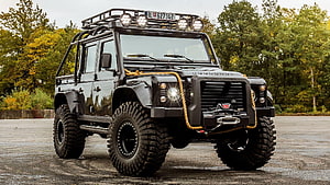 Black Land Rover Defender 110 Off-Road Pickup With Roof Rack And Bull Bar HD wallpaper
