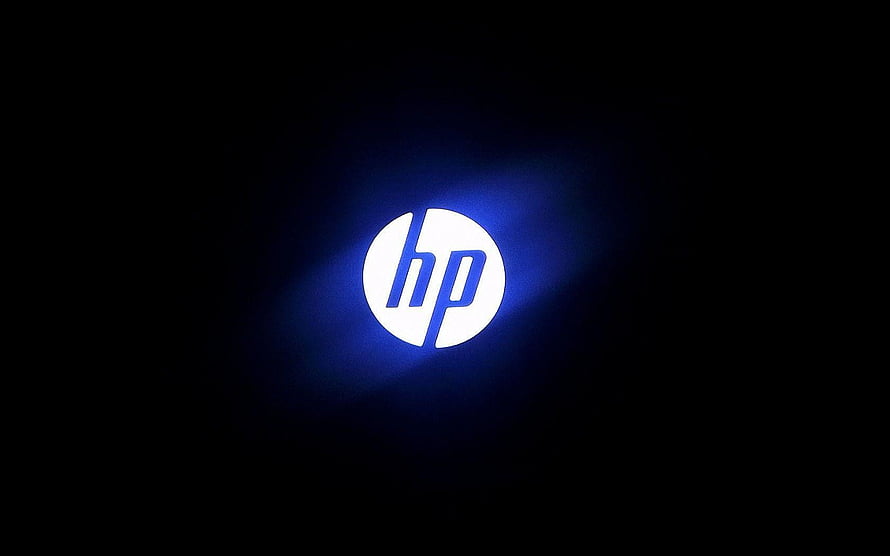 Illuminated HP Logo on Dark Background with Blue Glow Effect HD wallpaper
