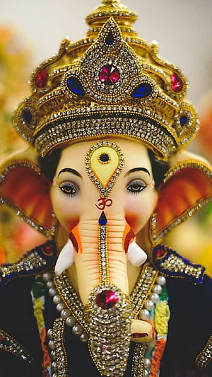 Ganesha Ornate Crown and Jewelry Close-Up Portrait HD phone wallpaper