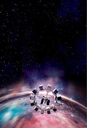 Interstellar Space Station Orbiting a Colorful Planet Against a Starry Nebula HD phone wallpaper