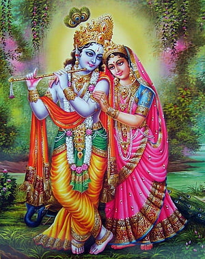 Radha Krishna Playing Flute in Lush Garden with Peacock Crown and Traditional Attire HD phone wallpaper