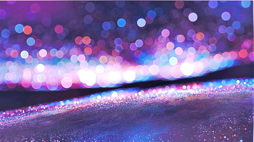 Vibrant Purple and Blue Bokeh Light Trails with Glittery Sparkle Surface HD wallpaper