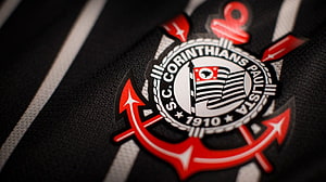 Close-up of the S.C. Corinthians Paulista club crest on a black and white striped jersey HD wallpaper