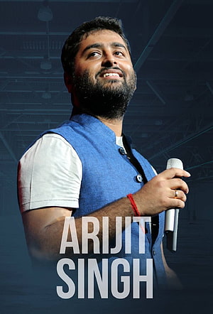 Arijit Singh Holding Microphone in Blue Vest on Stage HD phone wallpaper