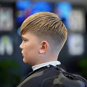 Modern Side Part Fade Haircut for Boys with Blonde Hair HD phone wallpaper