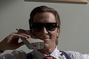 Patrick Bateman from American Psycho holding a vintage brick phone with sunglasses, American Psychos: Unpacking the Internet's Long, Awkward History With Patrick Bateman, #patrick bateman HD wallpaper