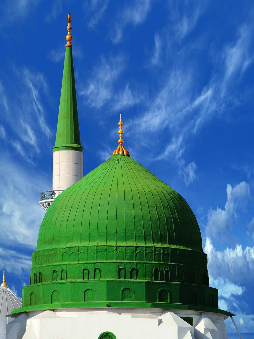 Green Dome and Minaret of the Prophet's Mosque in Medina Against a Blue Sky HD phone wallpaper