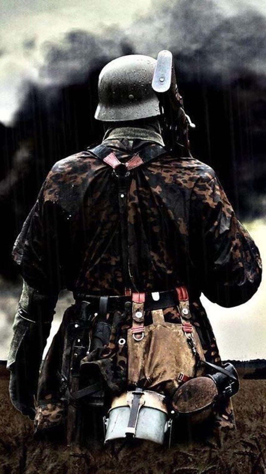 WWII German Soldier in Camouflage Standing in Rain with Smoke HD phone wallpaper