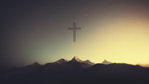 Minimalist Christian Cross Over Snow-Capped Mountain Peaks at Golden Hour HD wallpaper