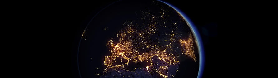 Earth at Night from Space with City Lights and Atmospheric Glow HD wallpaper