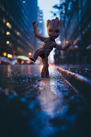Baby Groot Dancing on Wet City Street at Night HD phone wallpaper