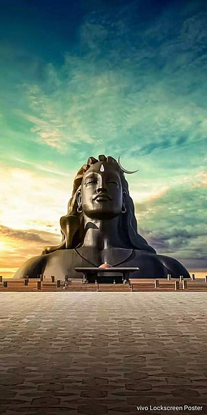 Majestic Lord Shiva Statue at Sunset with Serene Sky and Stone Plaza HD phone wallpaper