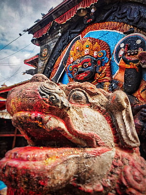 Kaal Bhairav Temple Sculpture with Intricate Carvings and Vibrant Colors HD phone wallpaper