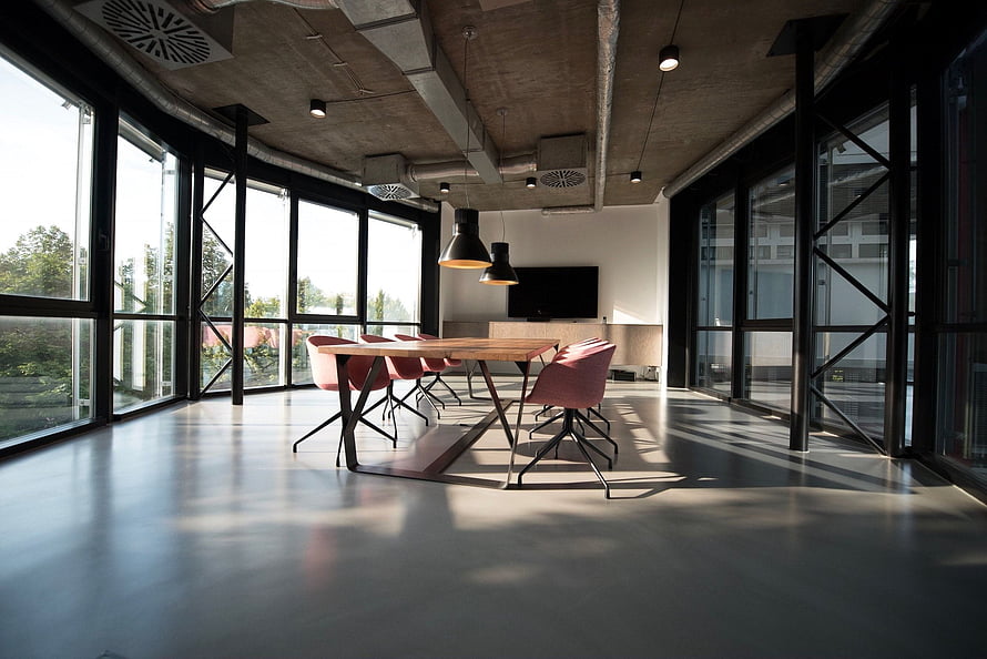 Modern Industrial Office Meeting Room With Concrete Ceiling And Floor To Ceiling Windows HD wallpaper