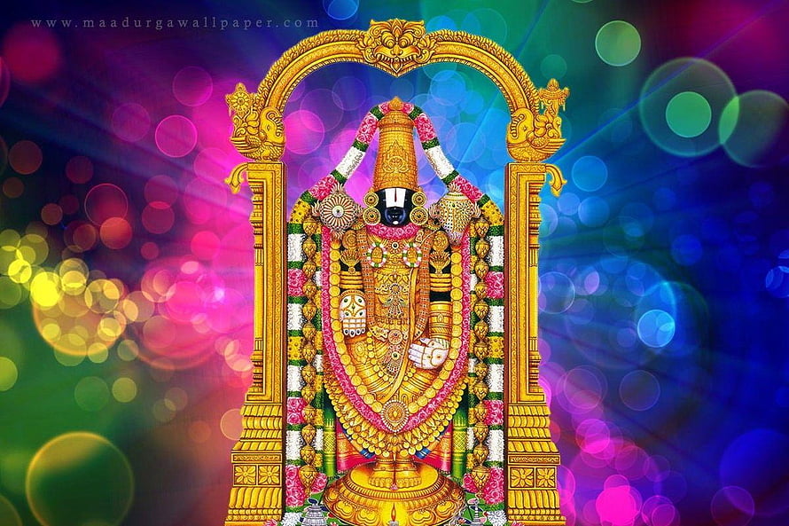 Lord Venkateswara adorned in gold ornaments and floral garlands within a golden archway HD wallpaper