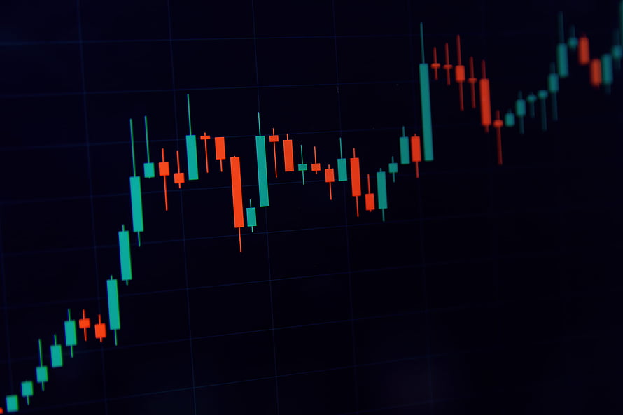 Japanese Candlestick Chart on Dark Grid for Technical Analysis and Trading HD wallpaper