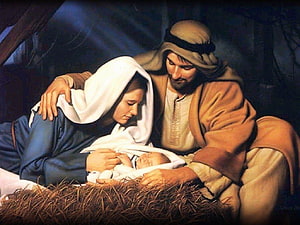 The Holy Family of Jesus, Mary, and Joseph in a Nativity Scene HD wallpaper