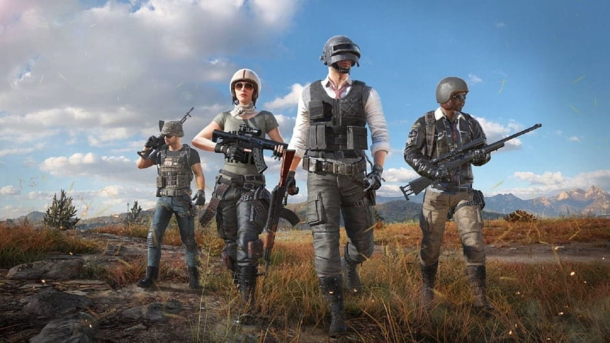 PUBG Mobile Squad of Four Armed Soldiers Walking Through Open Grassland HD wallpaper