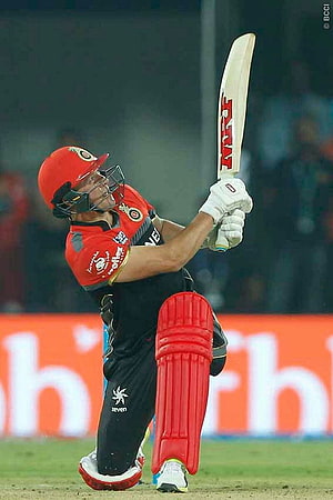 AB de Villiers in Red South Africa Kit Executing a Powerful Cricket Shot HD phone wallpaper