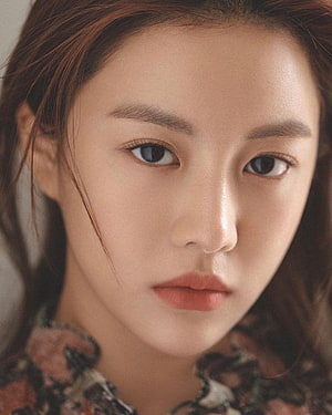 Go Yoon Jung Close-Up Portrait with Soft Natural Lighting and Floral Top HD phone wallpaper