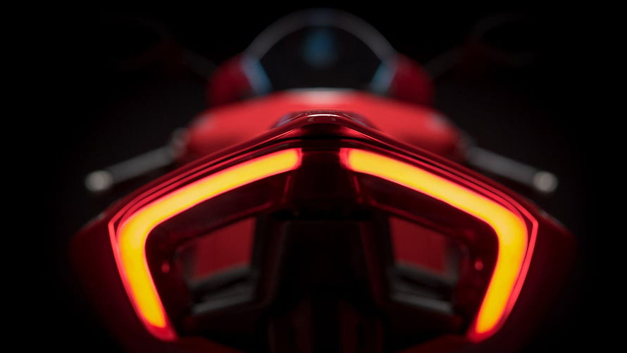 Ducati Panigale V4 Rear LED Taillight Close-Up in Dark Studio Setting HD wallpaper