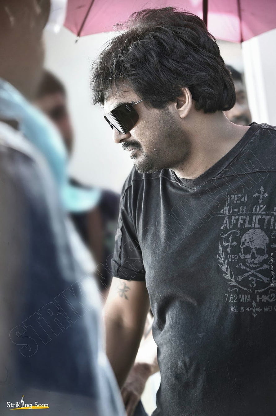 Puri Jagannadh in Profile Wearing Dark Sunglasses and Black Graphic T-Shirt HD phone wallpaper