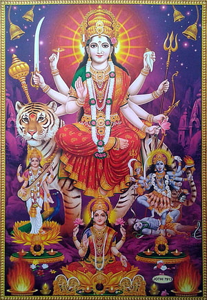 Goddess Durga Riding Tiger with Kali, Saraswati, and Lakshmi in Traditional Indian Art HD phone wallpaper