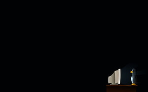 Minimalist Linux Tux Penguin Sitting at a Retro Computer on a Dark Background HD wallpaper