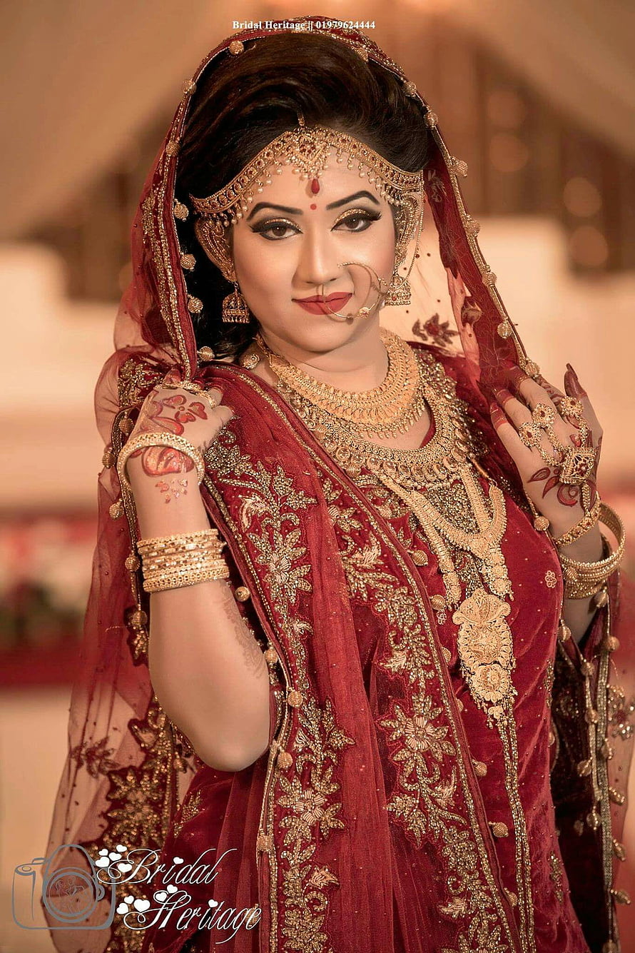 Elegant Indian Bride in Traditional Red Lehenga with Gold Jewelry and Henna HD phone wallpaper