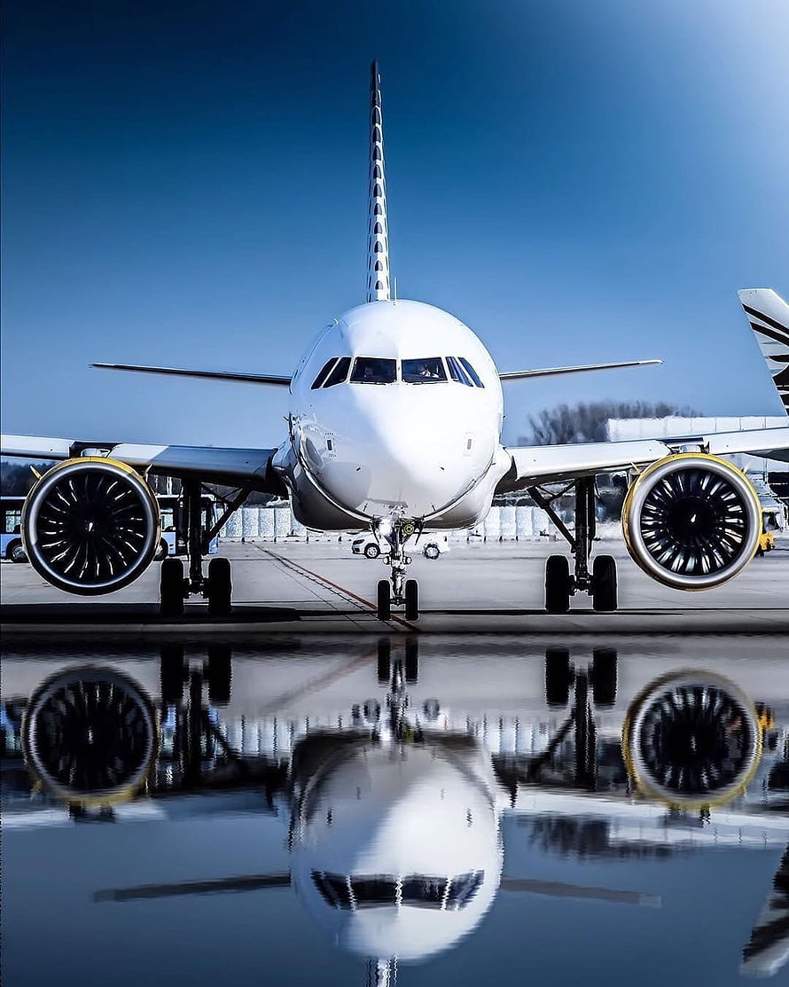 Airbus A320neo Commercial Jetliner Front View with Water Reflection on Airport Tarmac HD phone wallpaper