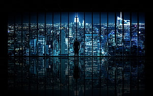Silhouette of a Businessman Standing in a High-Rise Office Overlooking a Glowing City Skyline at Night, 3 Traders, day trading HD wallpaper