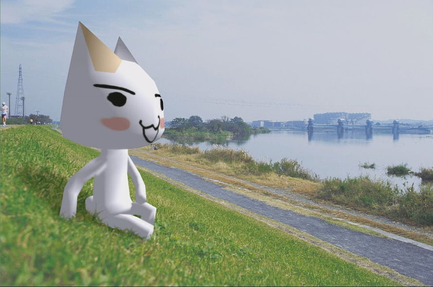 Toro from Doko Demo Issyo Sitting on a Grassy Riverbank Path HD wallpaper