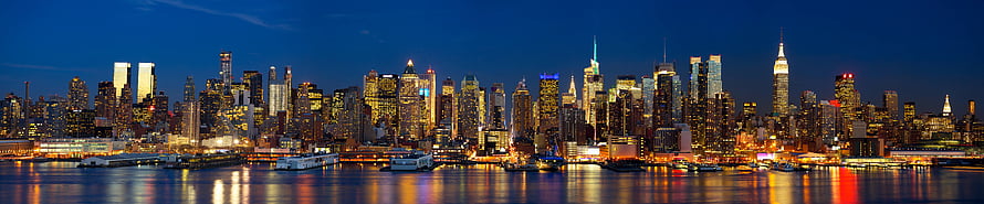 New York City Manhattan Skyline at Night with Waterfront Reflections HD wallpaper