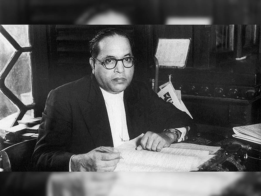 Dr B R Ambedkar Seated at Desk in Formal Attire Black and White Portrait HD wallpaper