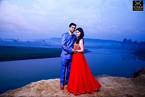 Romantic Pre-Wedding Portrait of a Couple in Formal Attire by a Misty Lake HD wallpaper