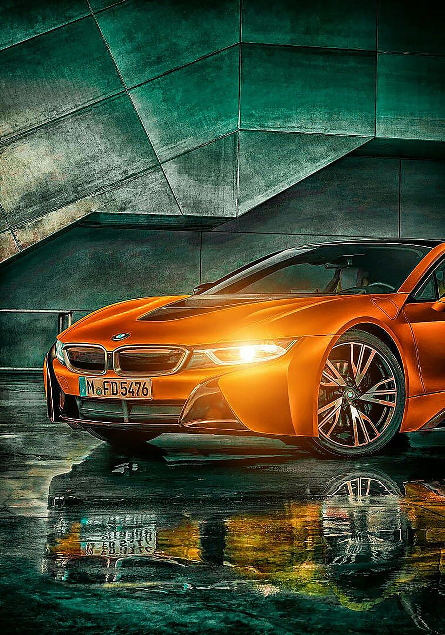 Orange BMW i8 sports car parked on wet pavement with dramatic teal architectural background HD phone wallpaper