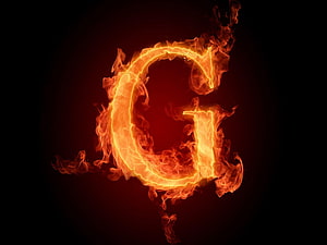 Flaming Letter G Fire Alphabet Design on Black Background HD wallpaper