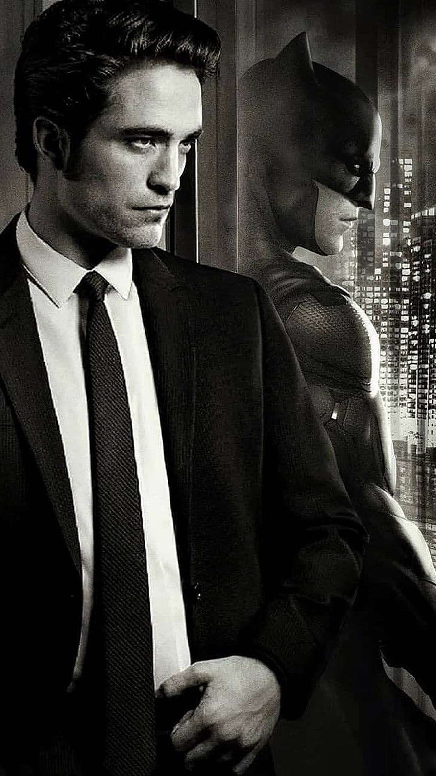 Robert Pattinson as Bruce Wayne and Batman in a moody black and white portrait HD phone wallpaper