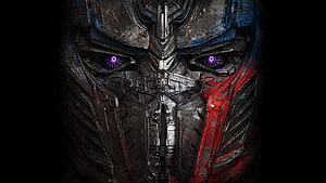 Optimus Prime Close-Up Portrait with Glowing Purple Eyes and Weathered Metallic Armor HD wallpaper